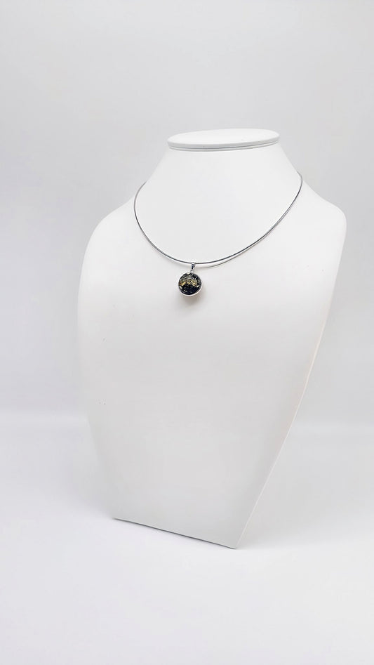 Timeless silver pendant with black amber
