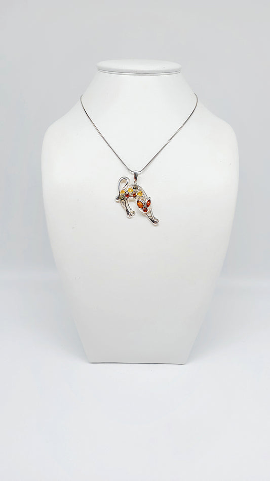 Exquisite cat pendant with sparkling amber and colorful stones
