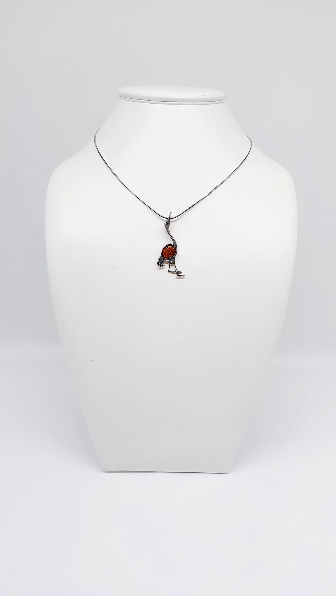 Edler Kranich-Schmuck aus Silber und Bernstein