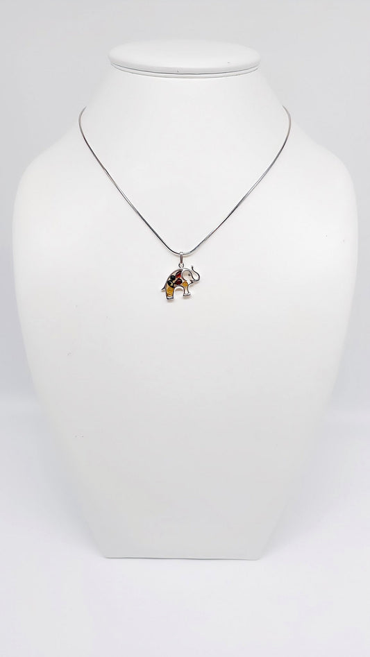 Elephant pendant made of silver with amber – a child’s favorite