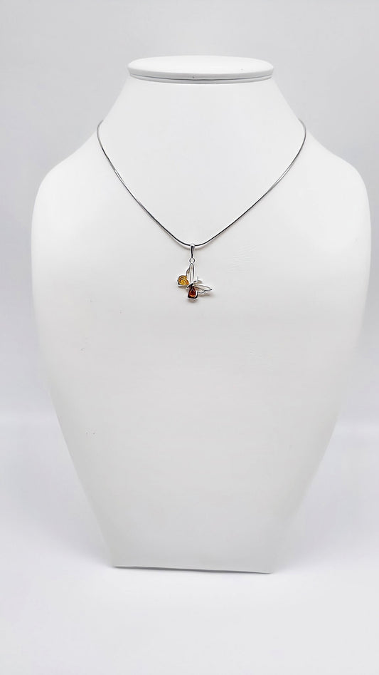 Silver butterfly pendant with colorful amber