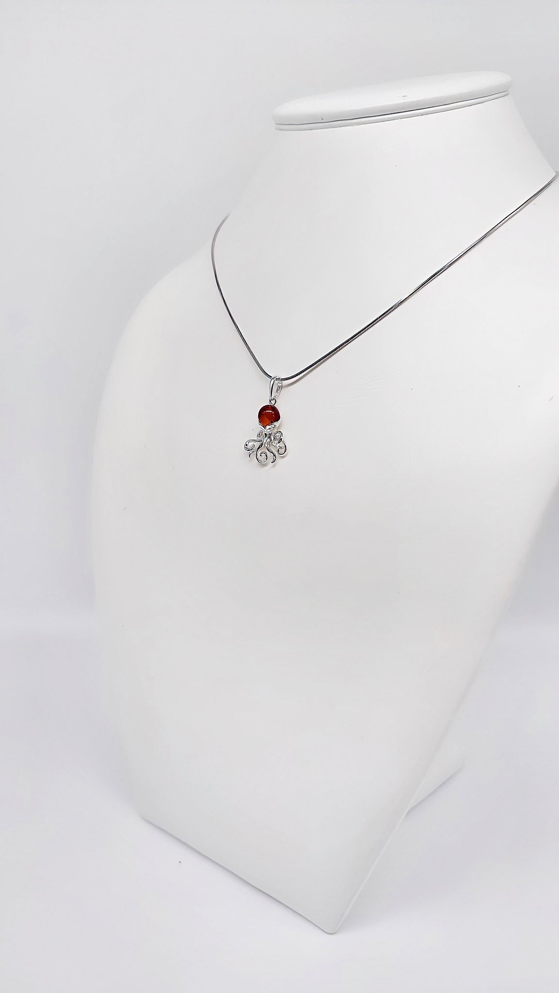 Exquisite octopus-shaped amber pendant