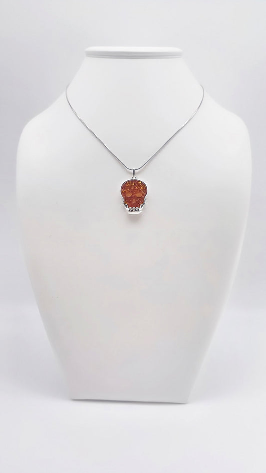 Sterling silver skull with amber