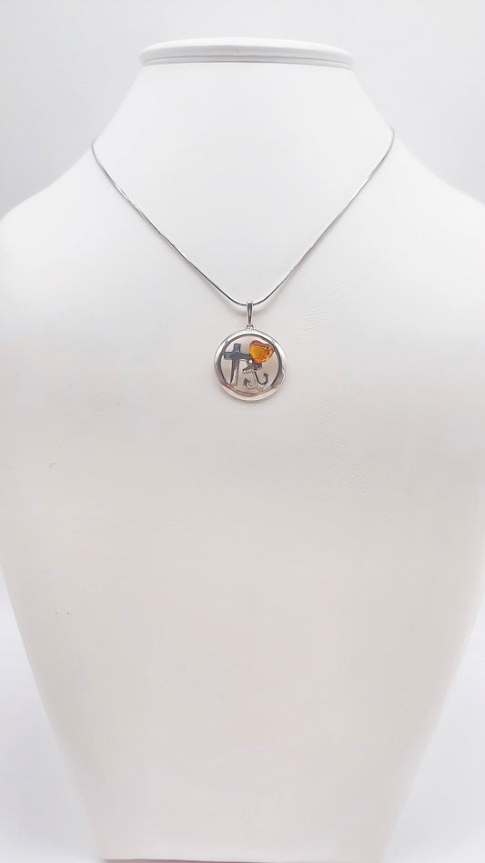 Symbolism in silver: cross, anchor and heart