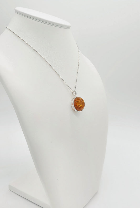 Convertible amber pendant in sterling silver