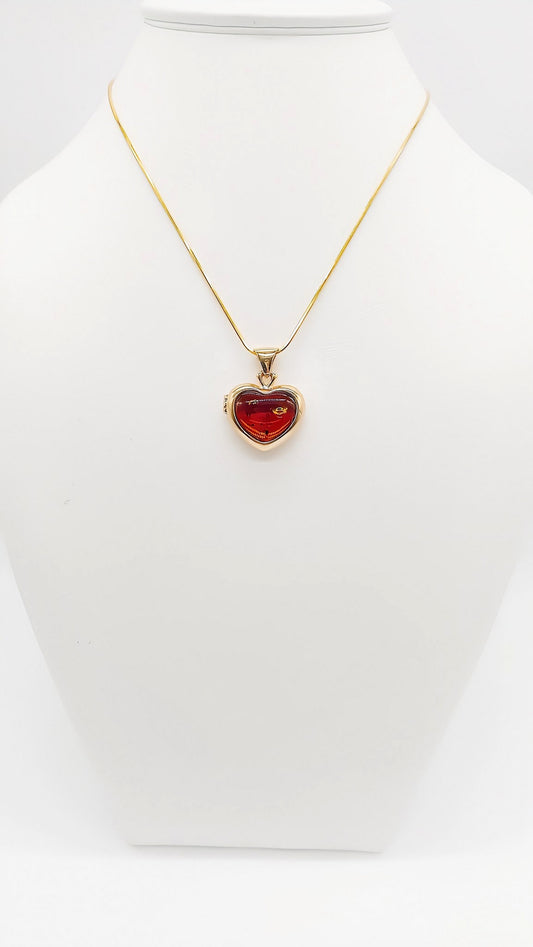 Hinged heart locket made of amber and gold-plated silver