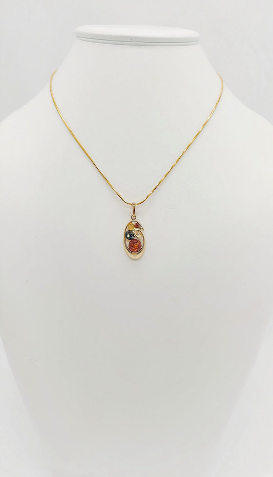 Filigree pendant made of gold-plated silver with amber