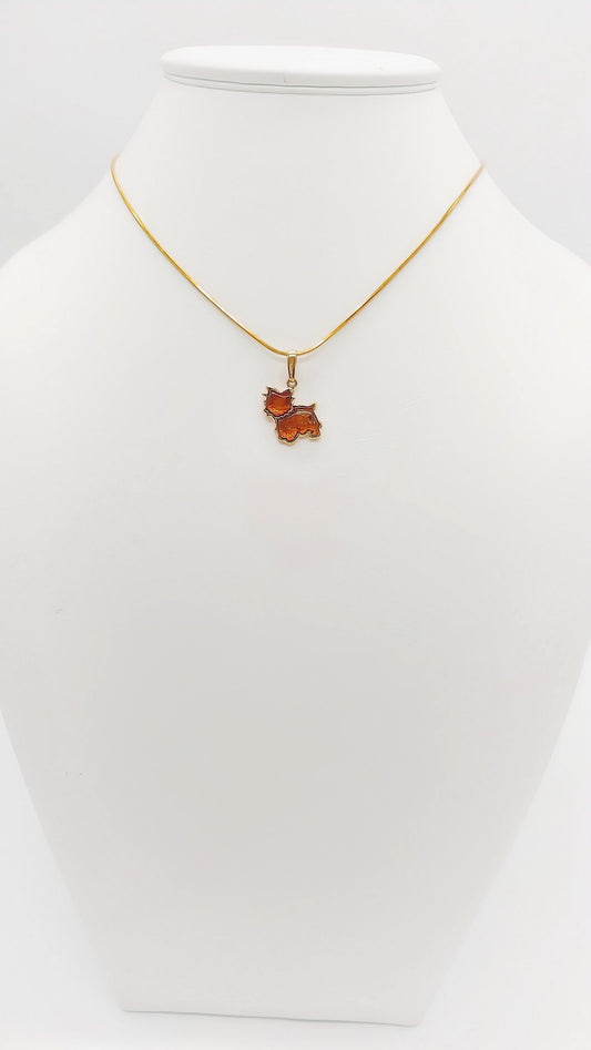 Dog pendant made of gold-plated silver with amber