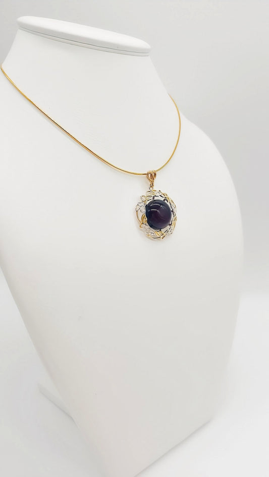 Romantic pendant with red amber & gold-plated details