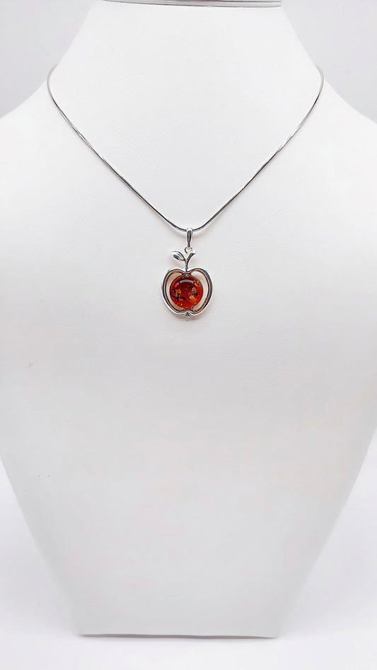 Timeless apple-shaped pendant with amber and silver