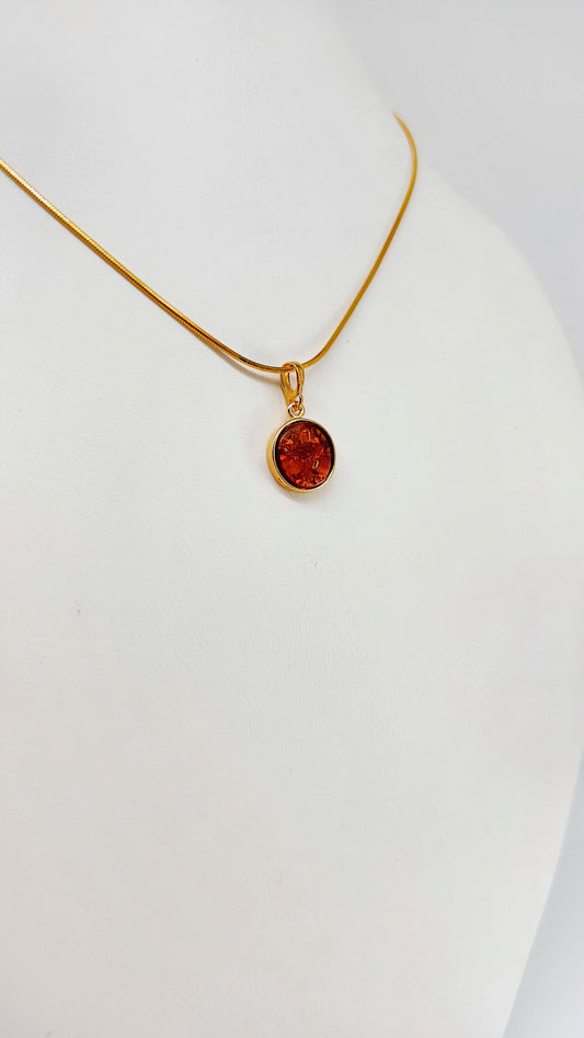 Elegant round amber pendant