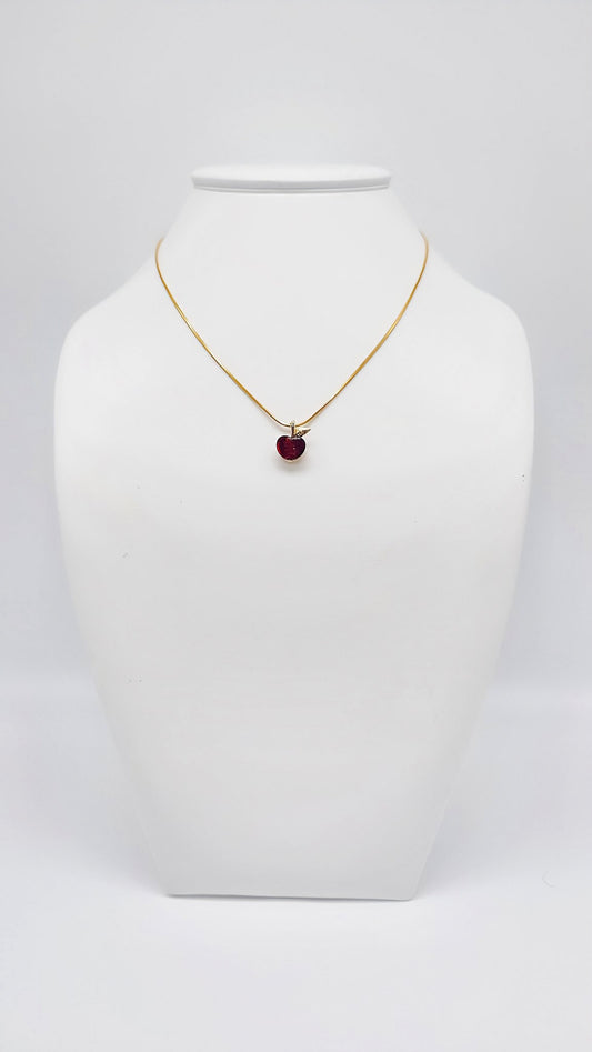 Lovely apple pendant made of amber