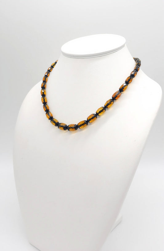 Simple elegance: amber necklace in brown-green
