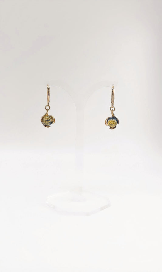 Gold-plated amber earrings with a filigree design