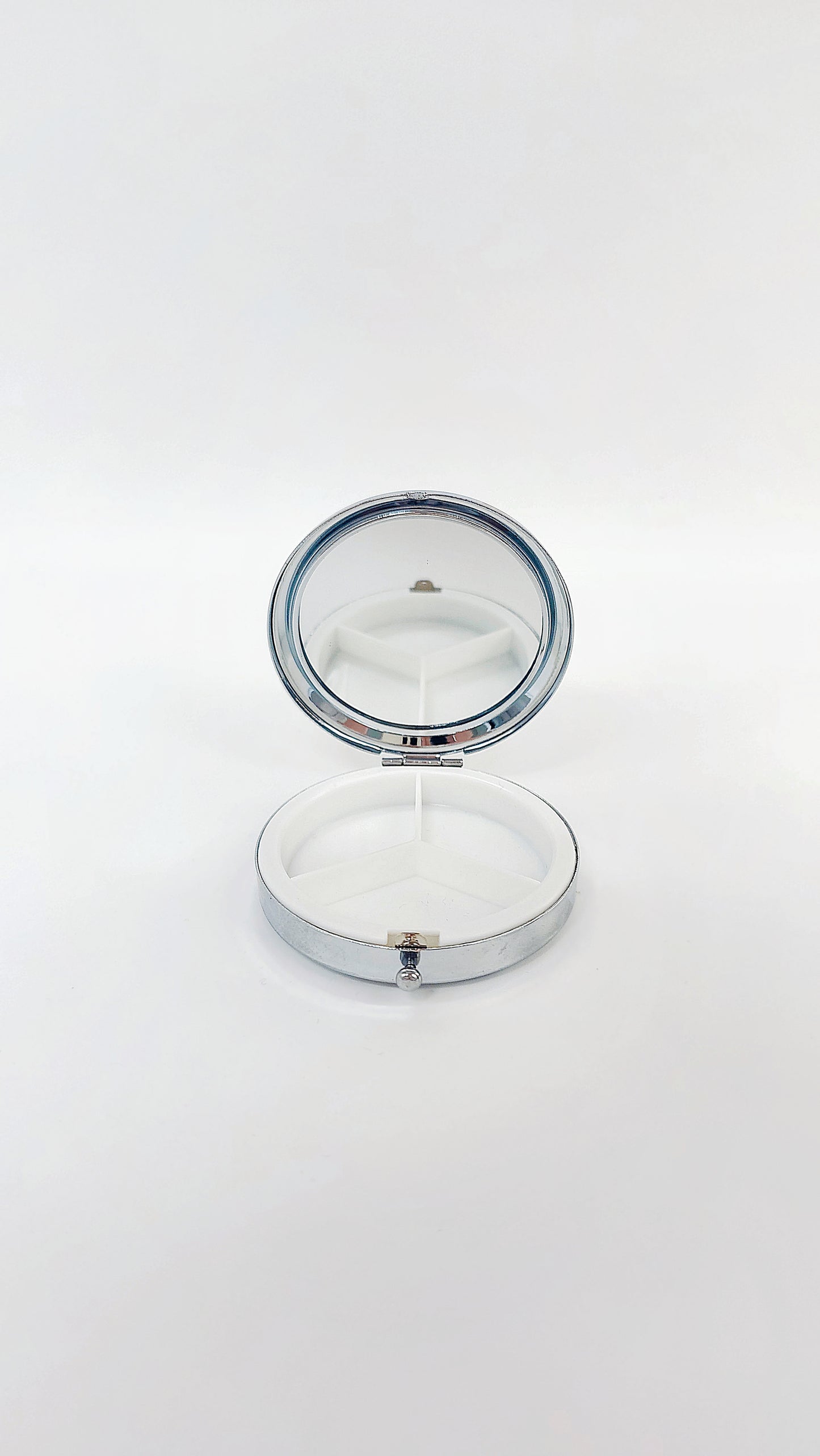Large round pill box with genuine amber & stainless steel