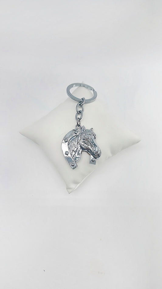 Horse and horseshoe keychain made of amber and metal