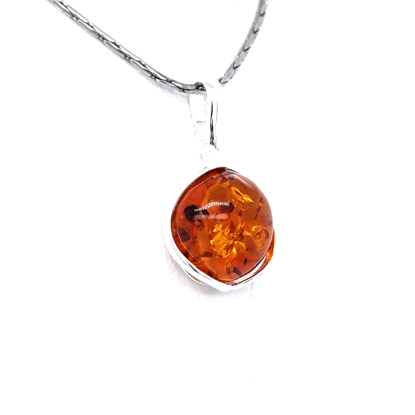 Alledaagse sieraden met groene barnsteen en zilver