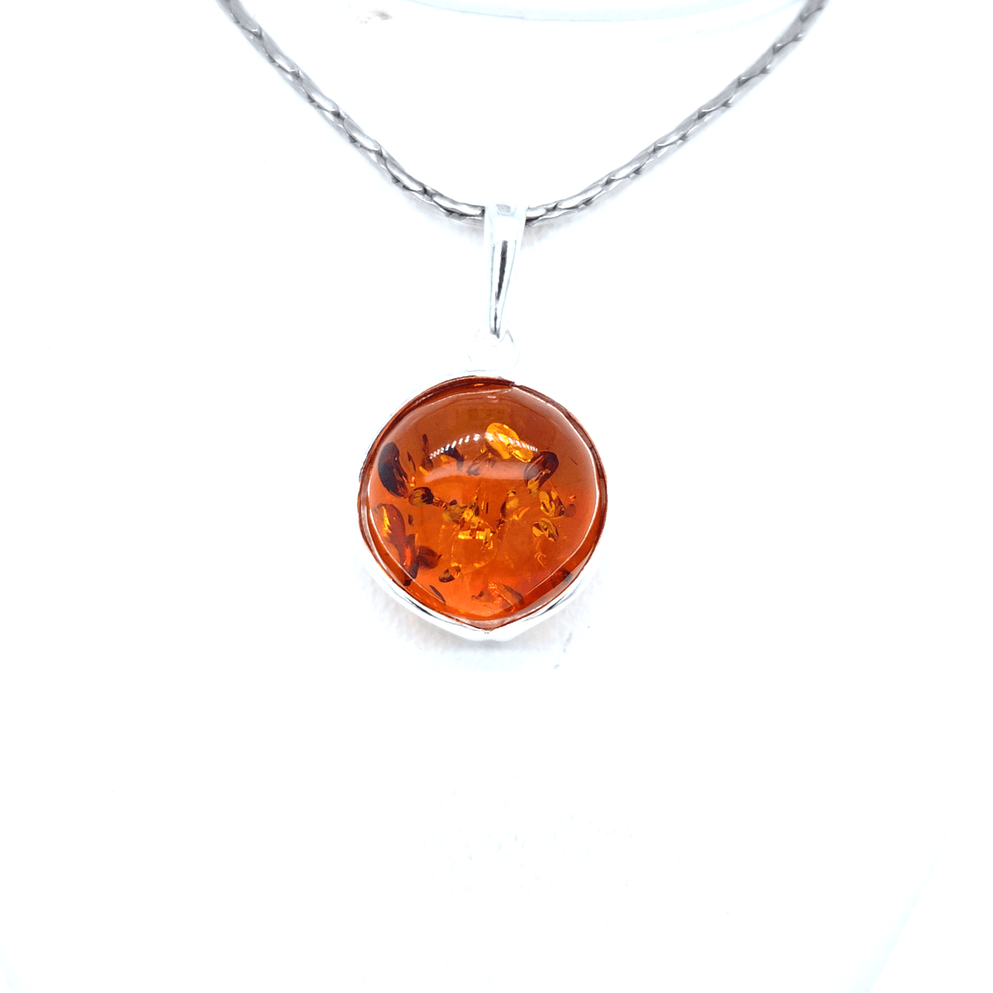 Alledaagse sieraden met groene barnsteen en zilver