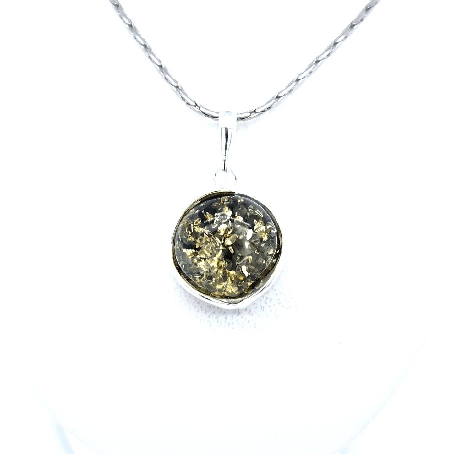 Alledaagse sieraden met groene barnsteen en zilver