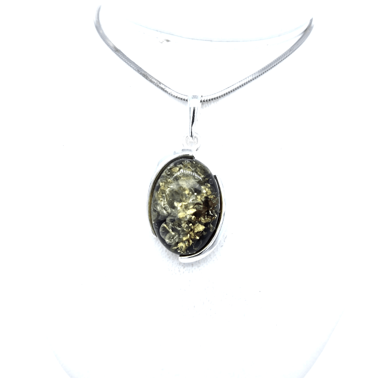 Ladies' pendant with green or cognac amber
