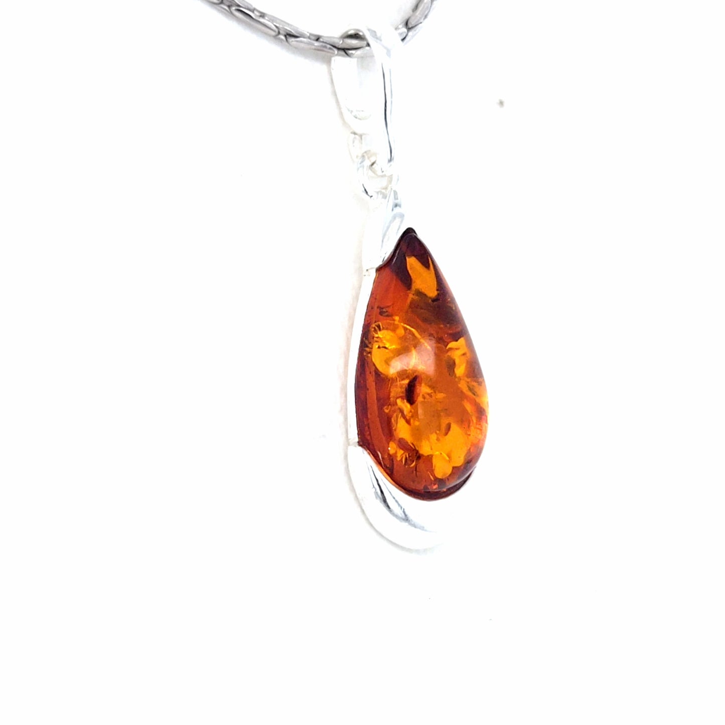Modern drop-shaped amber pendant, silver