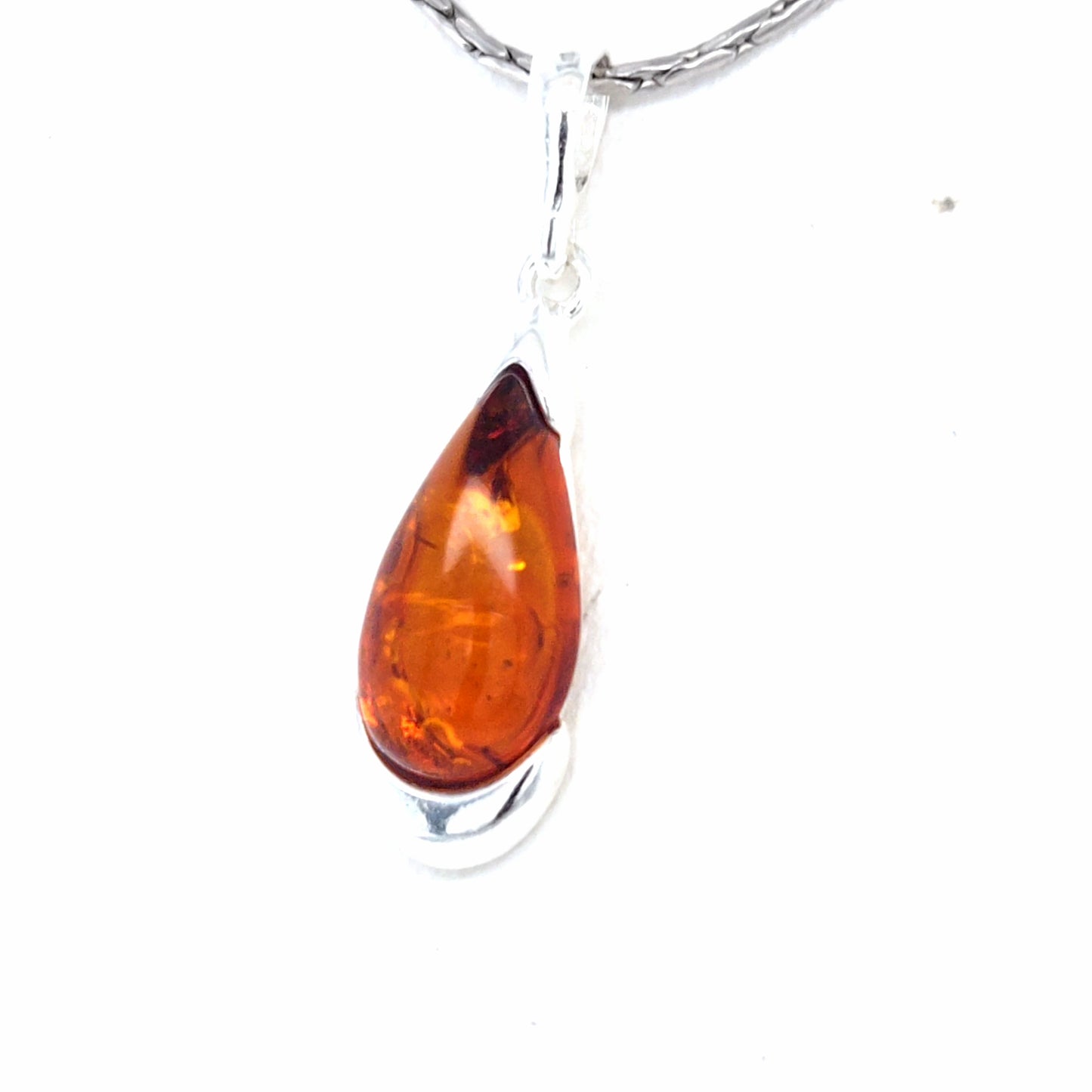 Modern drop-shaped amber pendant, silver