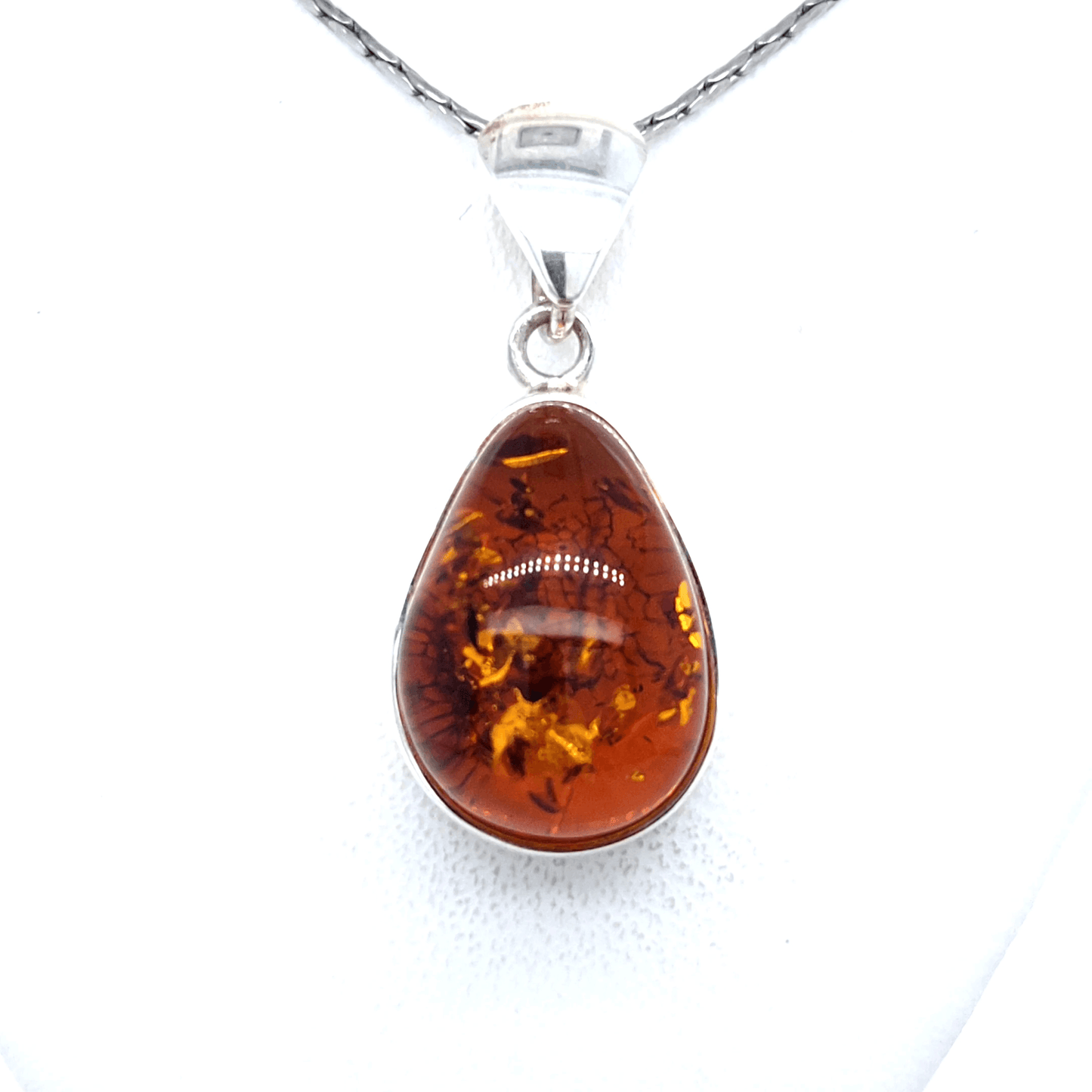 Elegant Silver Pendant with Baltic Amber