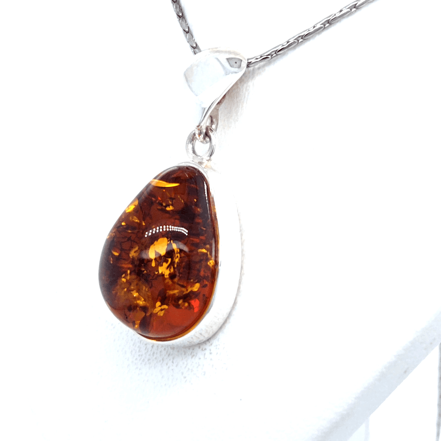 Elegant Silver Pendant with Baltic Amber