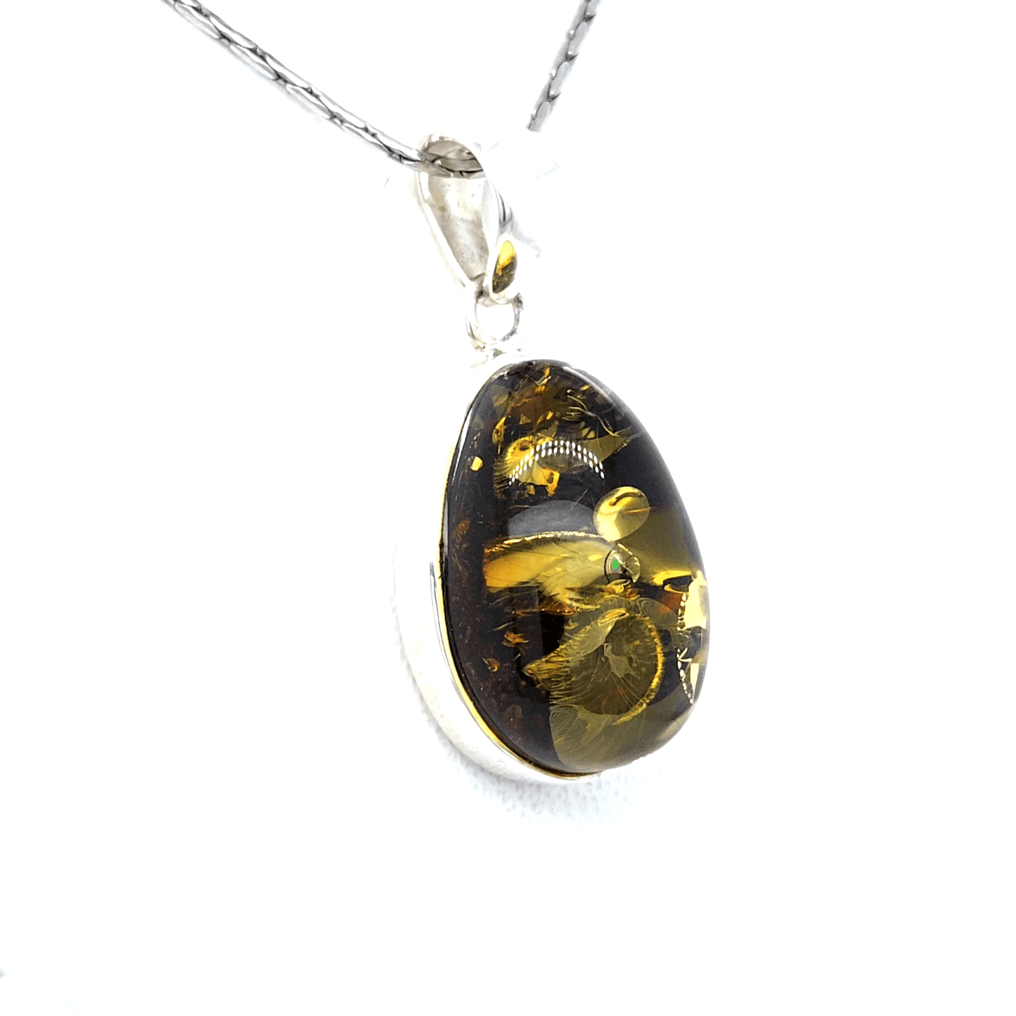 Green Amber Pendant made of 925 Silver Unique Piece