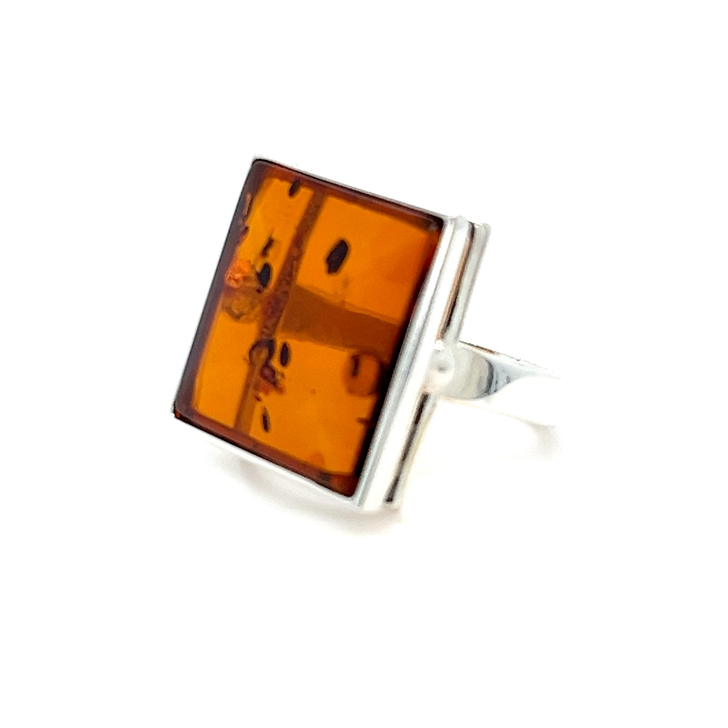 Quadratischer Bernsteinring – stilvoller Silberschmuck