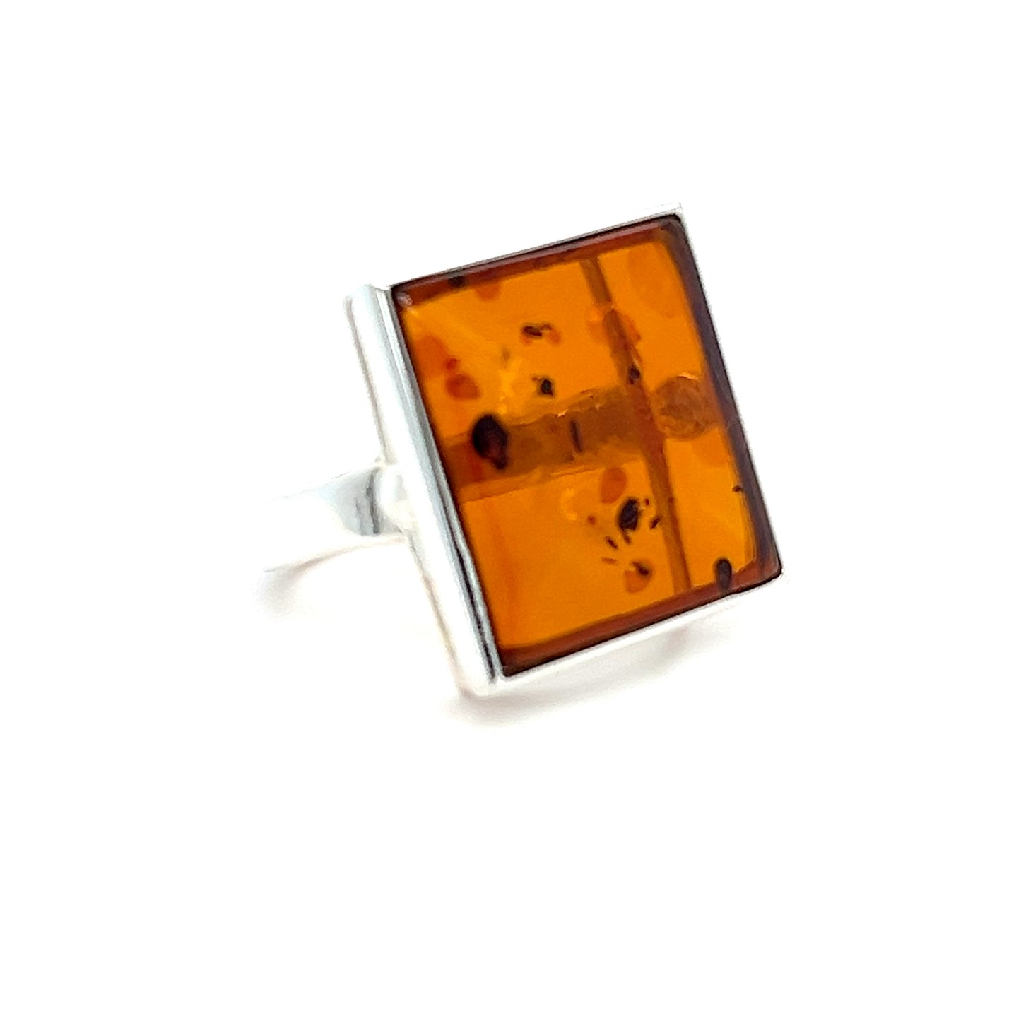 Quadratischer Bernsteinring – stilvoller Silberschmuck