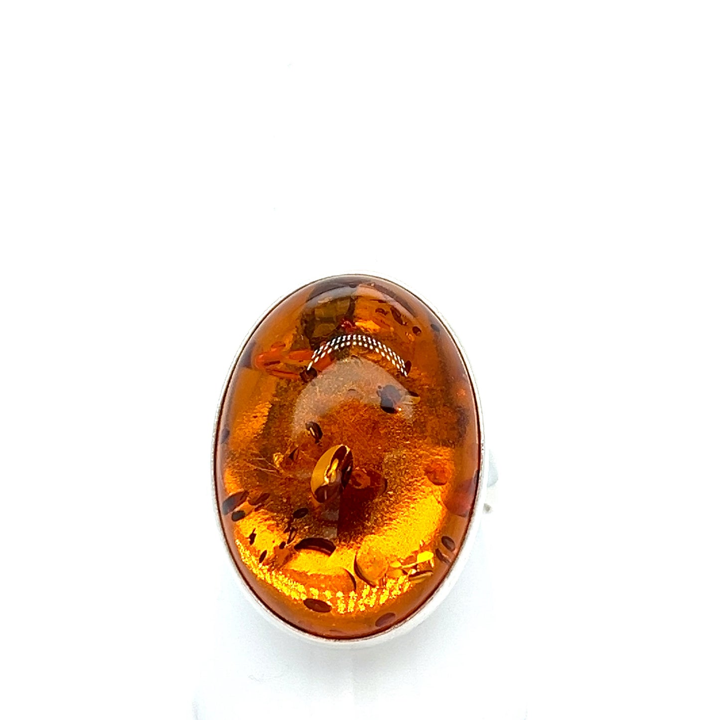 Elegant amber ring in silver – ideal oval shape