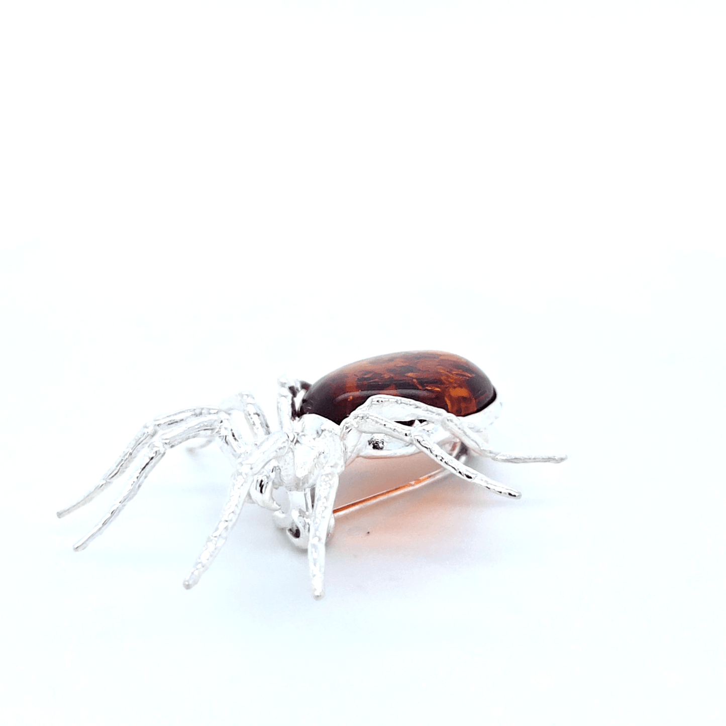 Artistic Spider Brooch in Silver and Amber