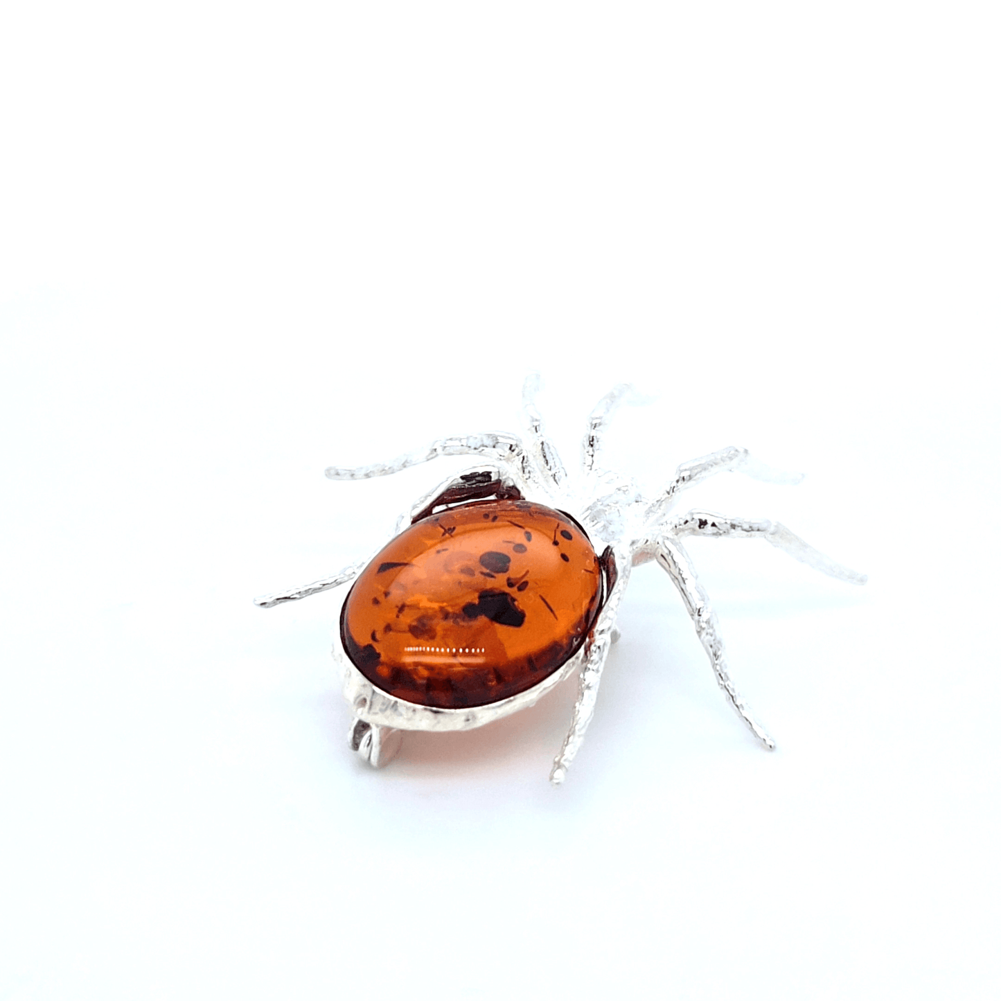 Artistic Spider Brooch in Silver and Amber