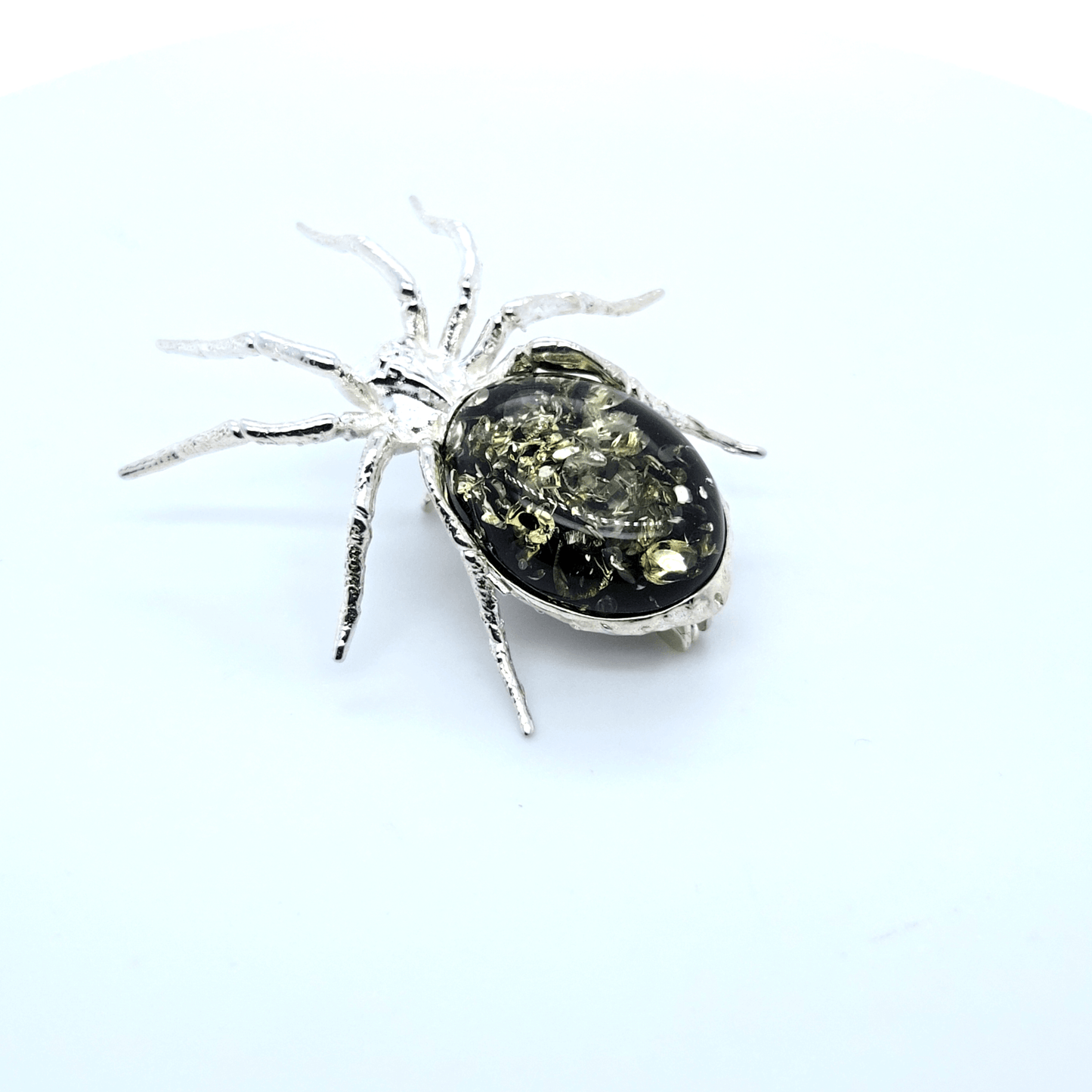 Artistic Spider Brooch in Silver and Amber