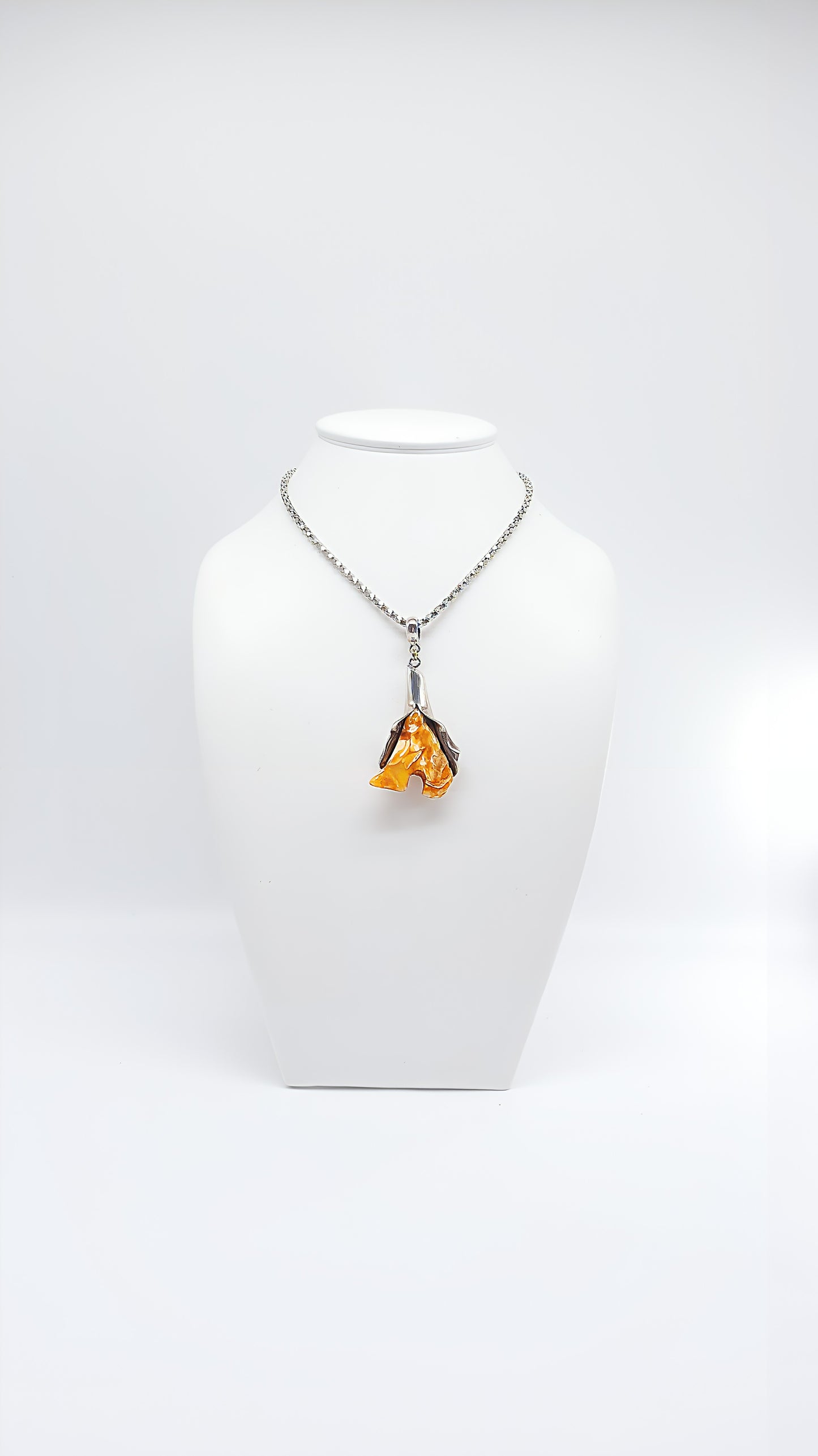 Whispering nature: unique amber pendant