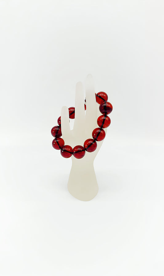 Bernstein-Armband: Strahlender Glanz in Rot