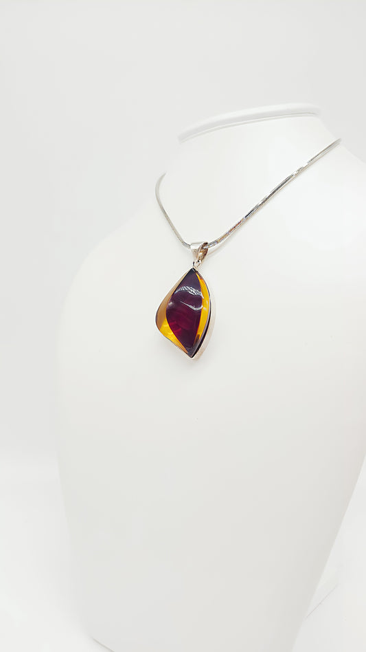 Unique shine: unique amber pendant