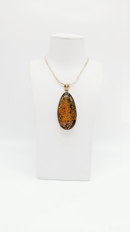 Amber drops in a noble silver frame