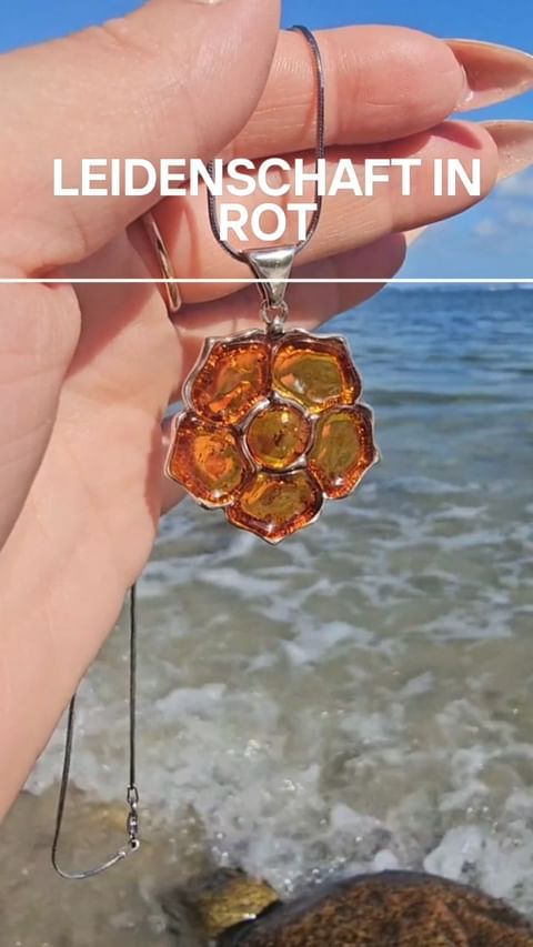 Fiery Blossom: Unique Amber Pendant