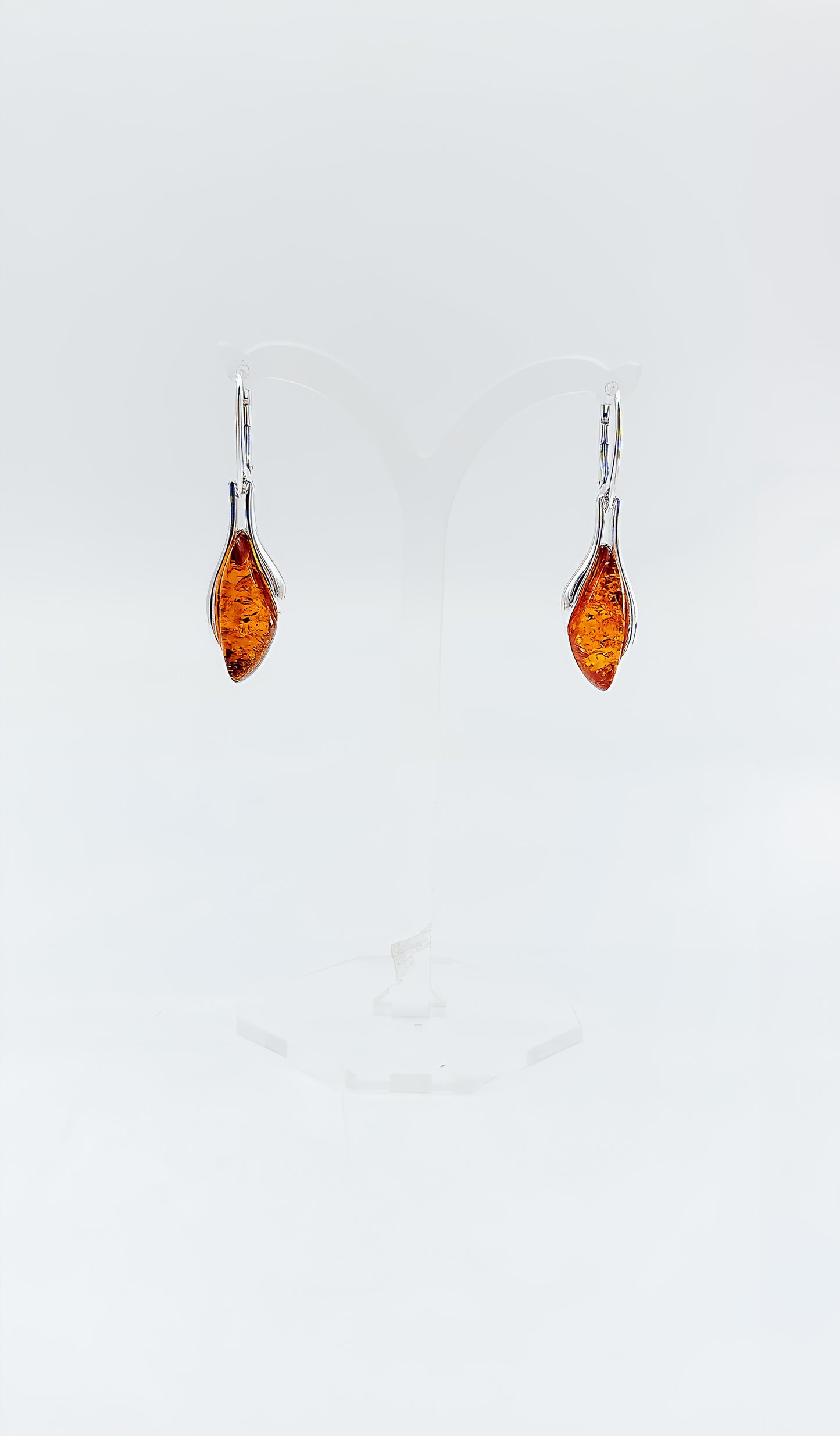 Amber earrings in flame shape – Exclusive jewelry made of silver