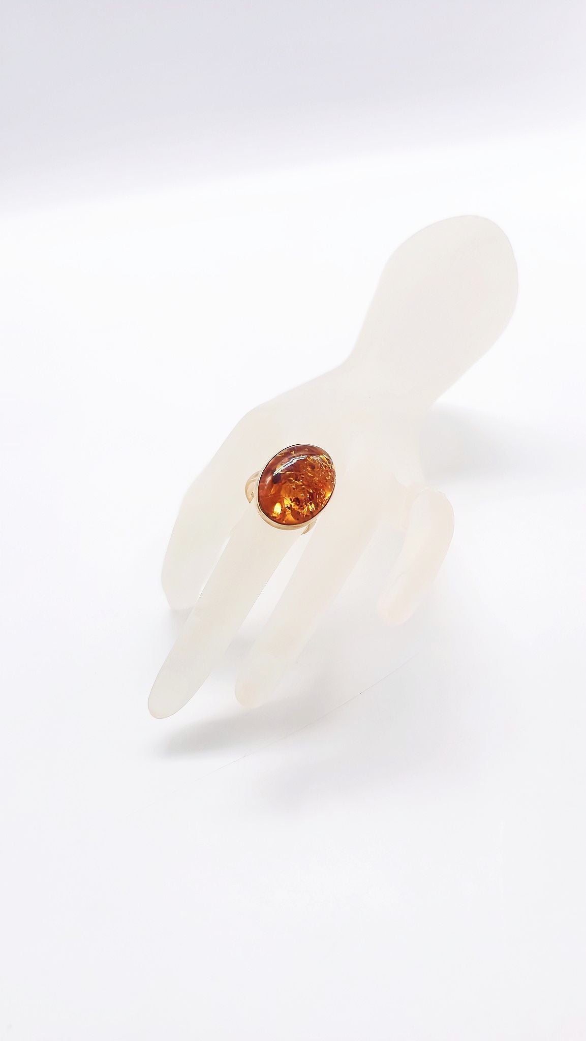 Shiny amber ring in a noble design