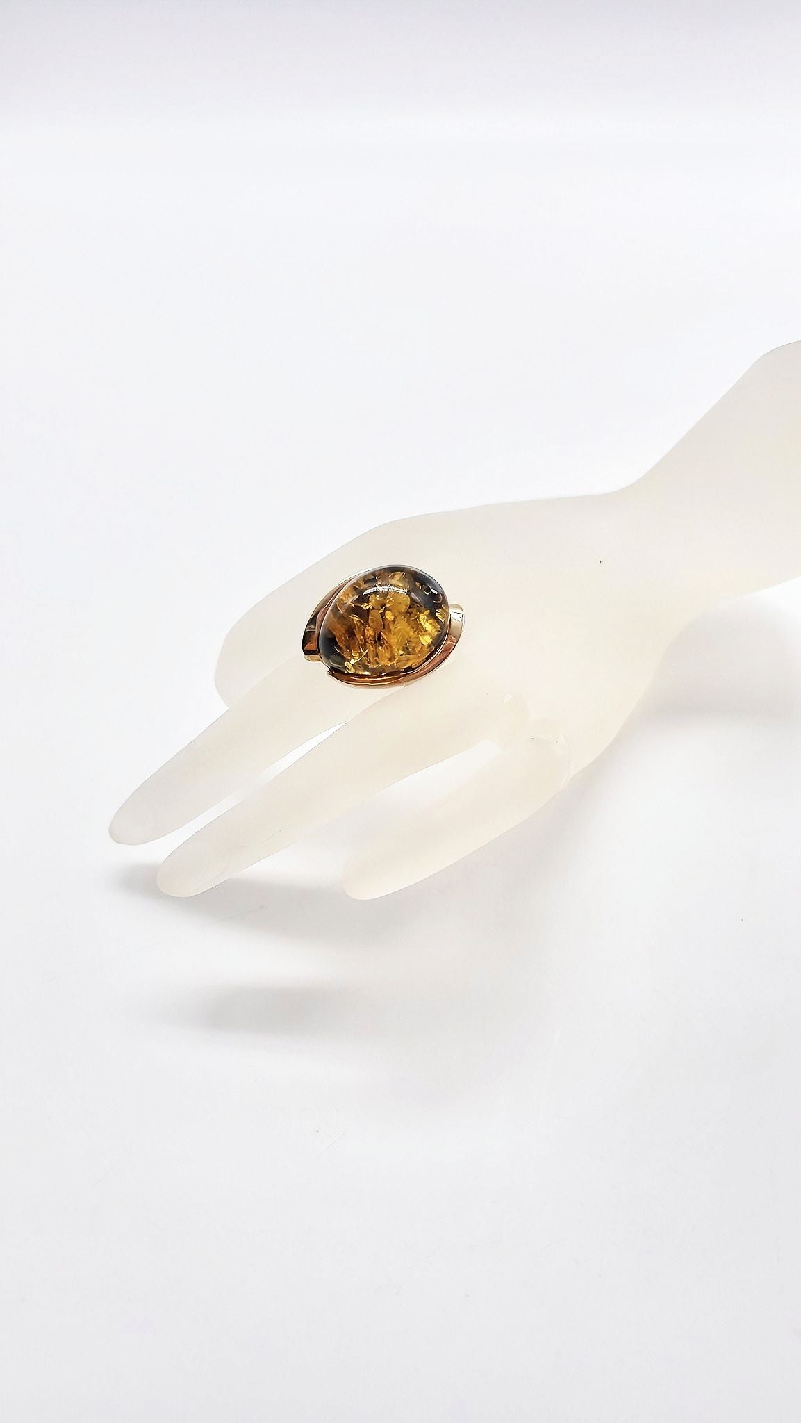 Elegant style: amber in gold setting