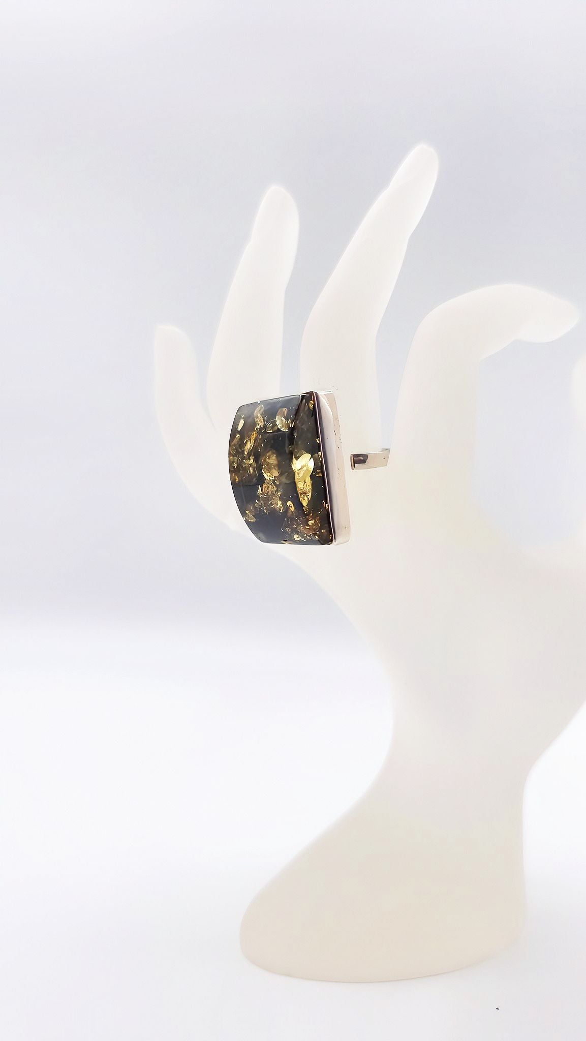 Adjustable silver ring with green amber – Handmade design