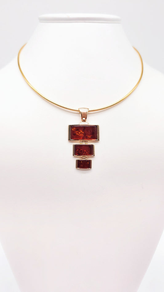 Exclusive unique pendant with amber
