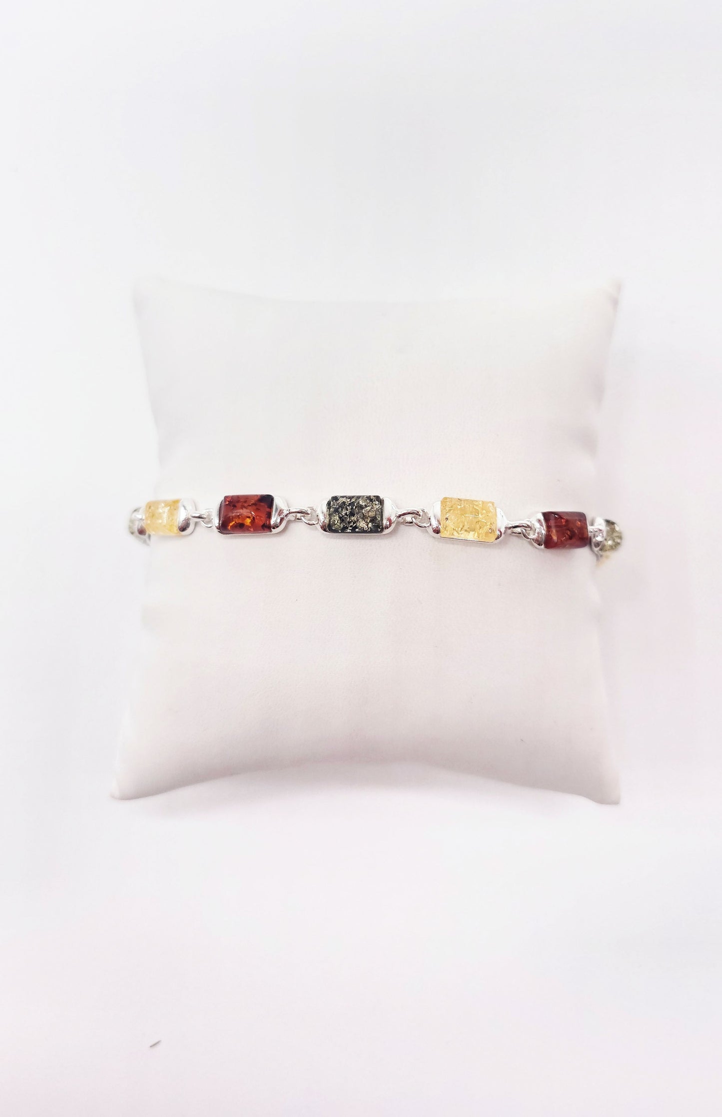 Classic bracelet with green amber for women