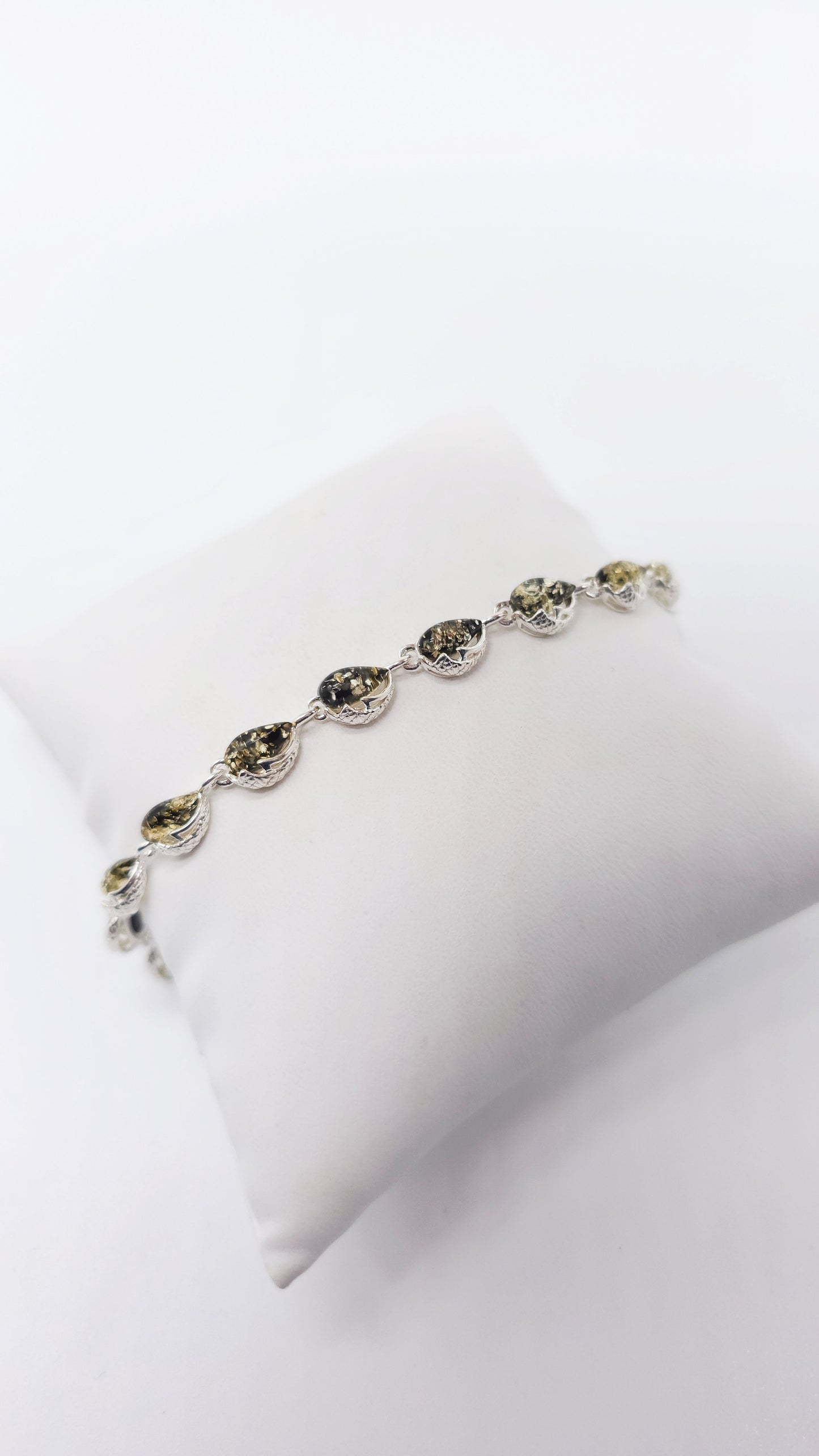 Silver drop bracelet with multicolor amber
