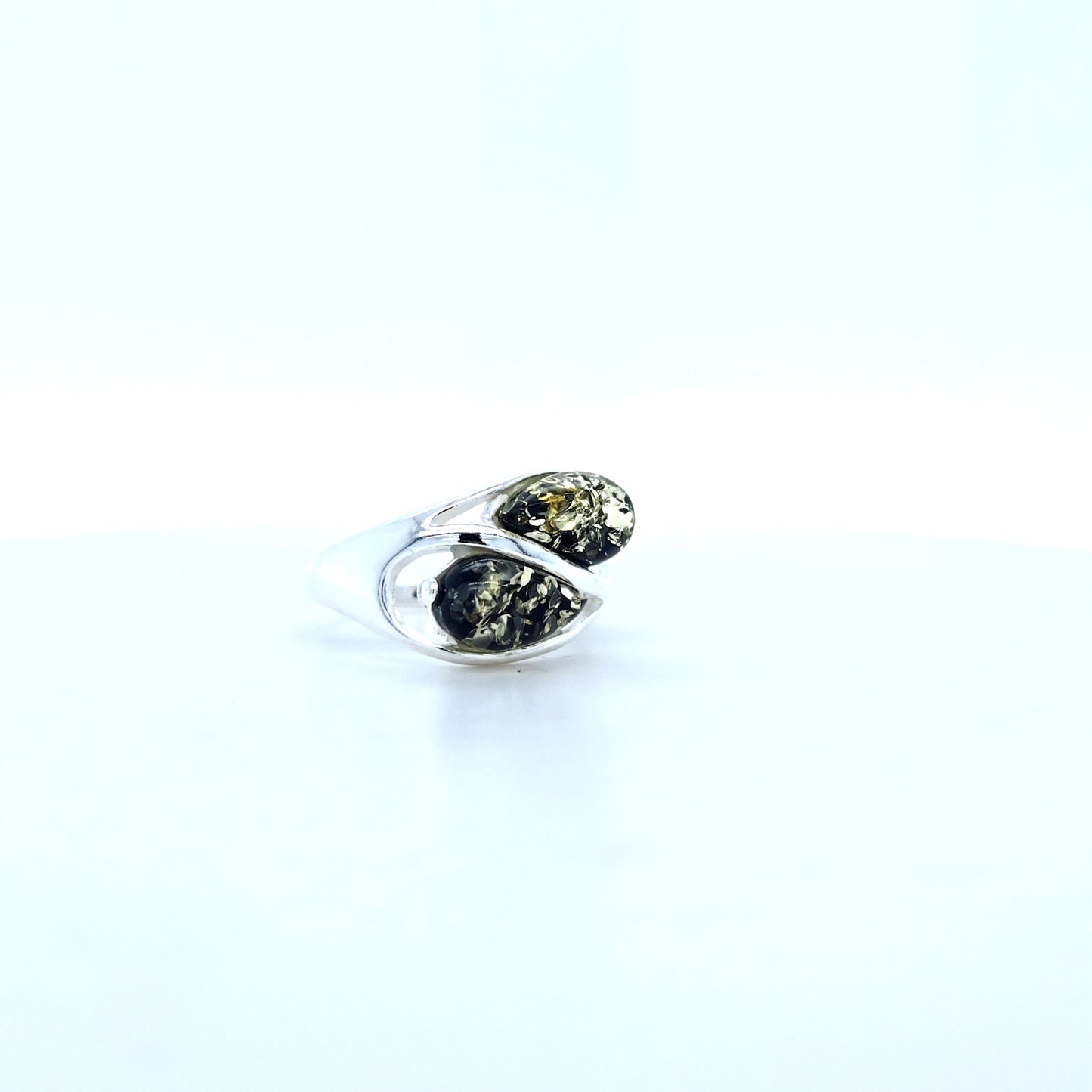 Elegant designer ring with yellow and red amber