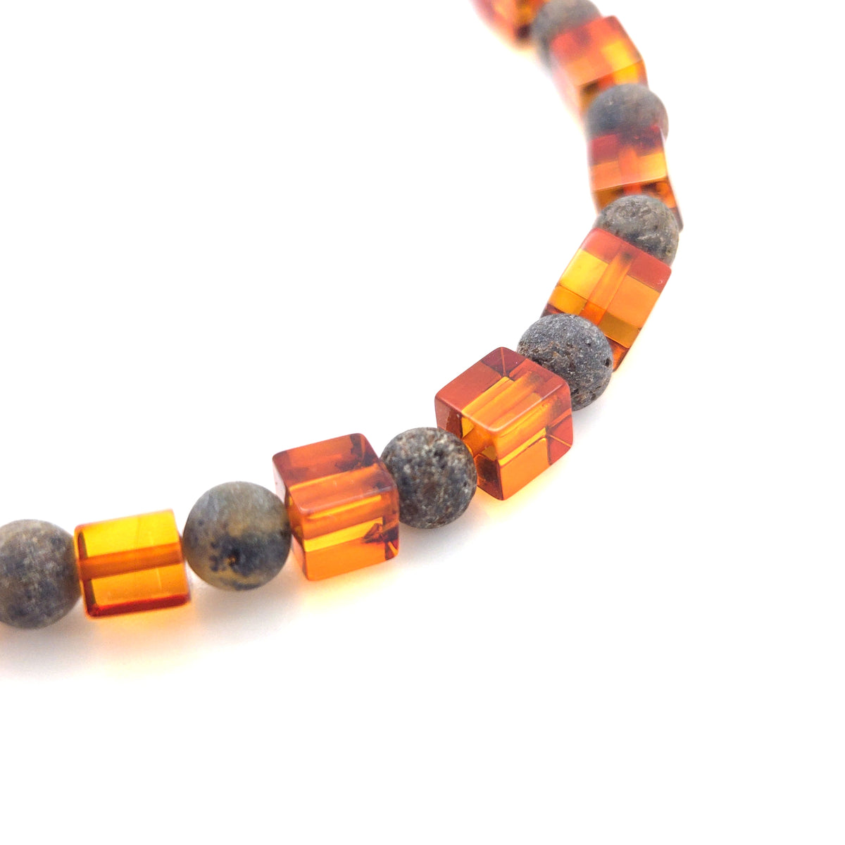 Geometrisches Stretch-Armband Unikat – Flexibler Naturstein-Schmuck mit echten Bernstein-Würfeln