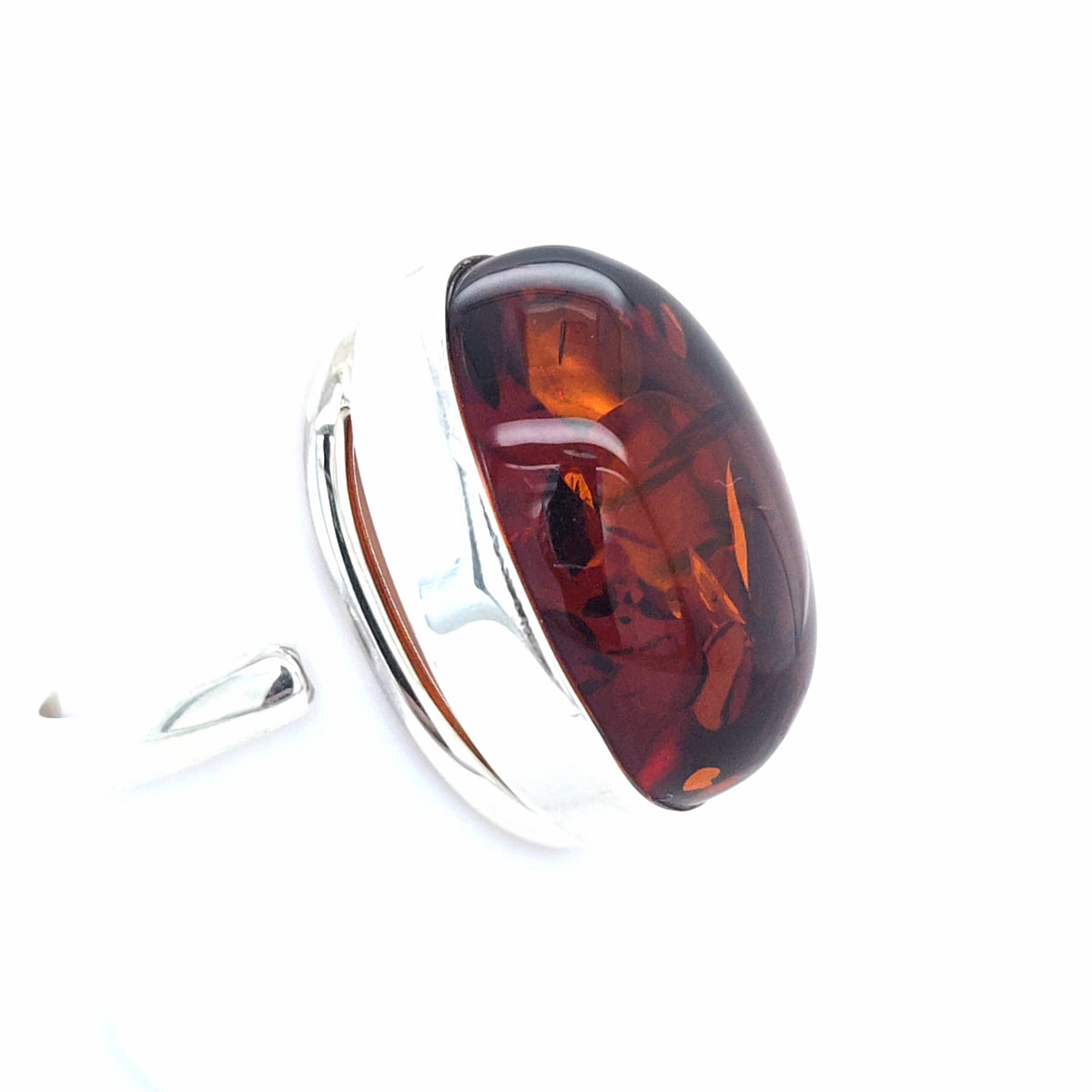 Ausdrucksstarker Bernstein-Ring in Silber – Modernes, offenes Design in leuchtendem Orange